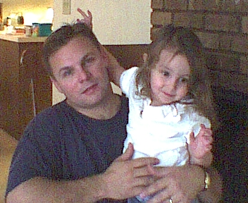 emmagivingdaddybunnyears.jpg
